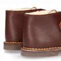 Nappa leather Safari boots with velcro strap and fake hair lining in COWHIDE color.