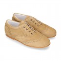 Laces up oxford shoes in suede leather for girls.