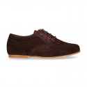 Laces up oxford shoes in suede leather for girls.