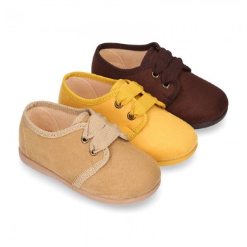 New Autumn winter canvas laces up shoes with ties closure in seasonal colors.