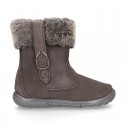 Suede leather boot shoes with side buckle and fake hair neck design for girls.