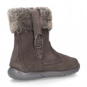 Suede leather boot shoes with side buckle and fake hair neck design for girls.