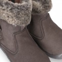 Suede leather boot shoes with side buckle and fake hair neck design for girls.