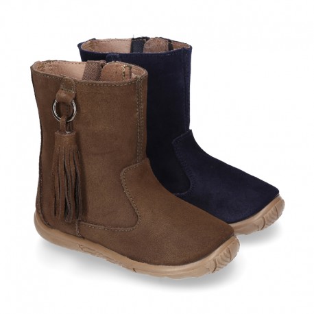 Suede leather boot shoes with side buckle with fringed design for girls.