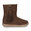 Suede leather boot shoes with side buckle with fringed design for girls.