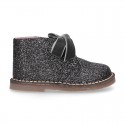 Classic GLITTER safari boots with velvet ties closure .