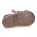 Classic GLITTER safari boots with velvet ties closure .