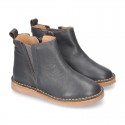 Casual SOFT NAPPA leather kids ankle boot shoes with elastic band and zipper closure.