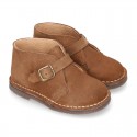 Suede leather Safari boots with buckle fastening for kids.