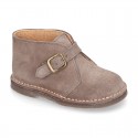 Suede leather Safari boots with buckle fastening for kids.