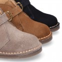 Suede leather Safari boots with buckle fastening for kids.