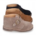 Suede leather Safari boots with buckle fastening for kids.