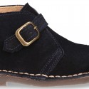 Suede leather Safari boots with buckle fastening for kids.