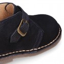 Suede leather Safari boots with buckle fastening for kids.