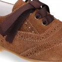 Classic perforated kids Suede leather Lace-up oxford shoes.