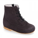 New girl Pascuala style boots in suede leather with perforated design.