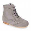 New girl Pascuala style boots in suede leather with perforated design.