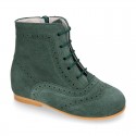 New girl Pascuala style boots in suede leather with perforated design.