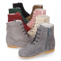 New girl Pascuala style boots in suede leather with perforated design.