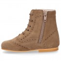 New girl Pascuala style boots in suede leather with perforated design.