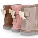 Suede leather Australian style Boot shoes with RIBBON design and fake hair lining.