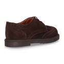 New Suede leather Oxford shoes with shoelaces closure and perforated design for kids.