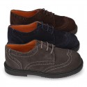 New Suede leather Oxford shoes with shoelaces closure and perforated design for kids.