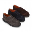 New Suede leather Oxford shoes with shoelaces closure and perforated design for kids.