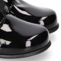 Classic BLACK patent leather ankle boots to dress with ties closure for first steps.