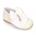 Classic sweet patent leather little Mary Janes with scallop and buckle with BOW design.