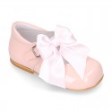 Classic sweet patent leather little Mary Janes with scallop and buckle with BOW design.