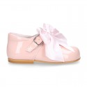 Classic sweet patent leather little Mary Janes with scallop and buckle with BOW design.