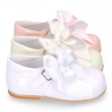 Classic sweet patent leather little Mary Janes with scallop and buckle with BOW design.