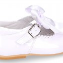 Classic sweet patent leather little Mary Janes with scallop and buckle with BOW design.