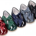 Classic patent leather little Mary Janes with scallop and buckle with BOW design.