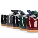 Classic patent leather little Mary Janes with scallop and buckle with BOW design.