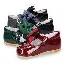 Classic patent leather little Mary Janes with scallop and buckle with BOW design.