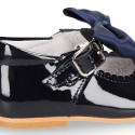 Classic patent leather little Mary Janes with scallop and buckle with BOW design.