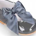 Classic patent leather little Mary Janes with scallop and buckle with BOW design.