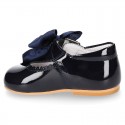 Classic patent leather little Mary Janes with scallop and buckle with BOW design.