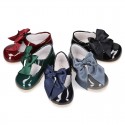 Classic patent leather little Mary Janes with scallop and buckle with BOW design.