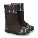 New suede leather boots combined with patent finish and CRYSTALS design.