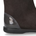 New suede leather boots combined with patent finish and CRYSTALS design.