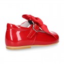 Classic RED patent leather little Mary Janes with scallop and buckle with BOW design.