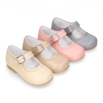 Classic Nappa leather little Mary Janes with perforated design.