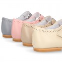 Classic Nappa leather little Mary Janes with perforated design.