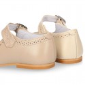 Classic Nappa leather little Mary Janes with perforated design.