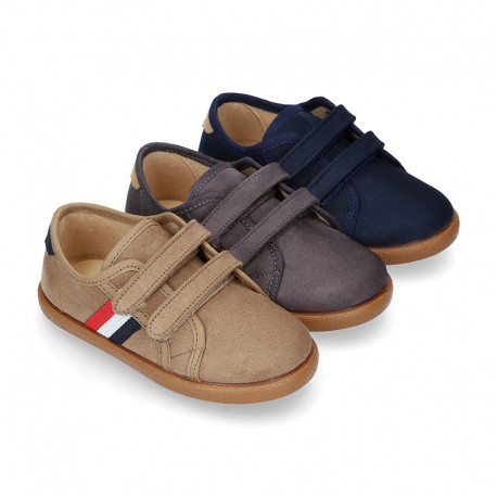 New autumn winter canvas tennis style shoes with flag detail and VELCRO strap.