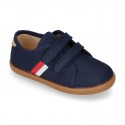 New autumn winter canvas tennis style shoes with flag detail and VELCRO strap.