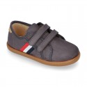 New autumn winter canvas tennis style shoes with flag detail and VELCRO strap.